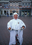 lady biker in rain, Ijsselmeer